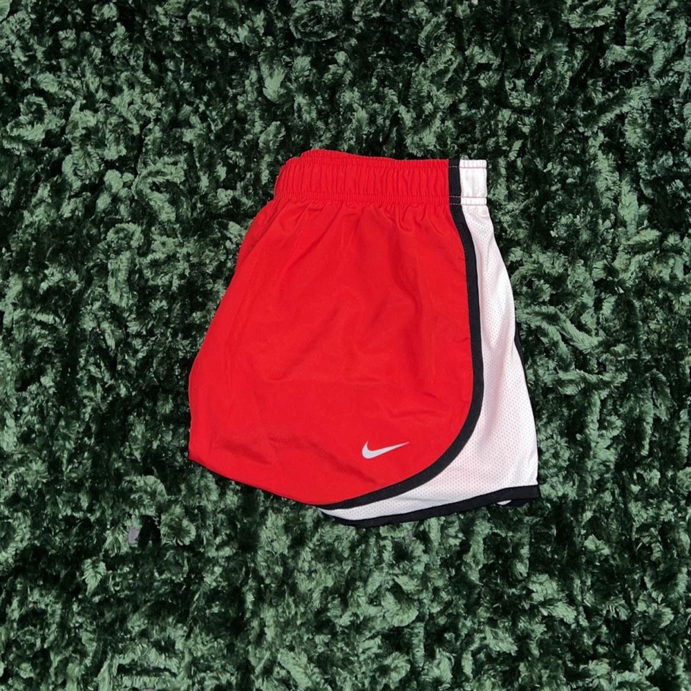 Medium Nike athletic shorts , red bottoms